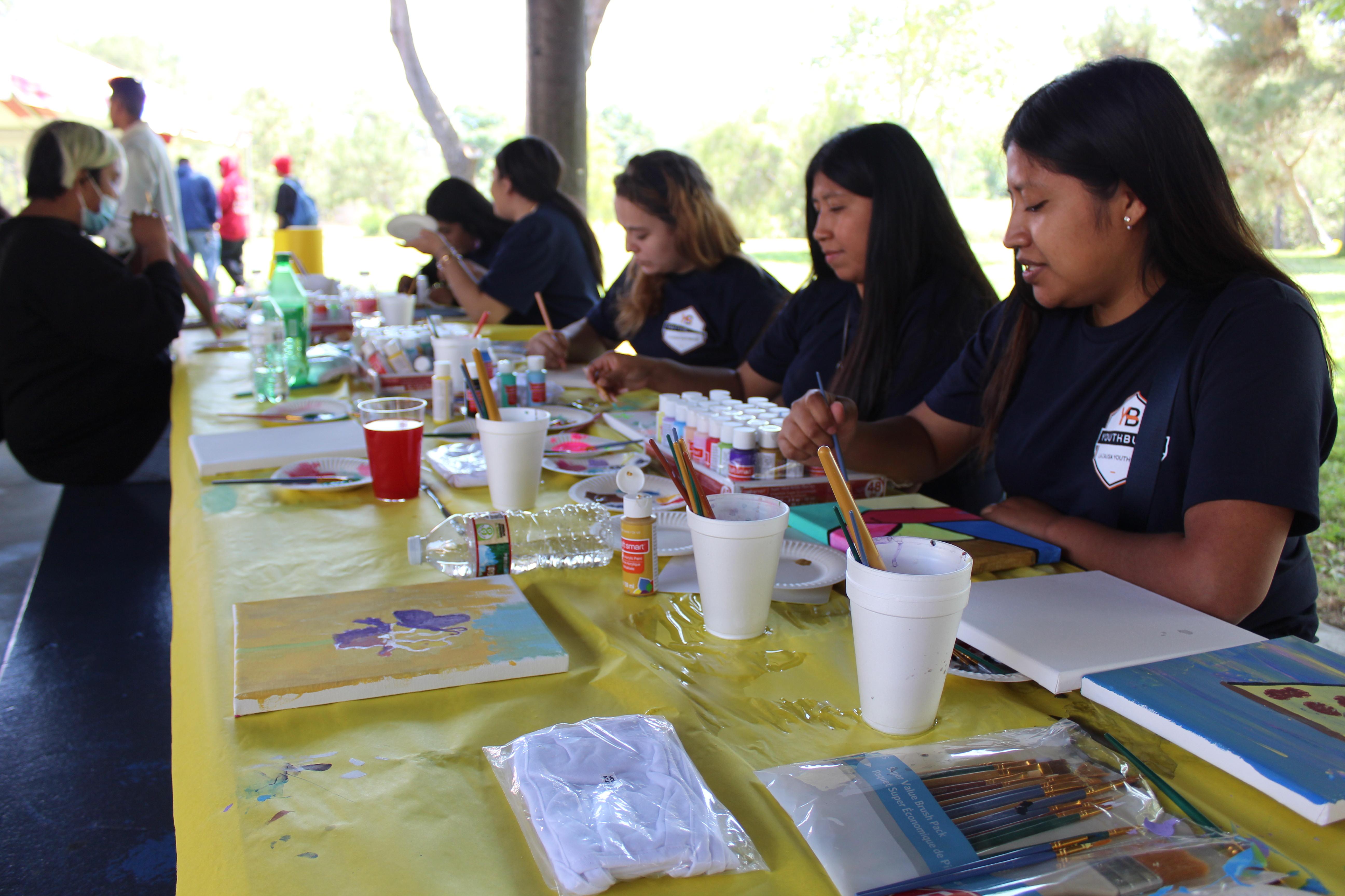 LA CAUSA students working on art projects