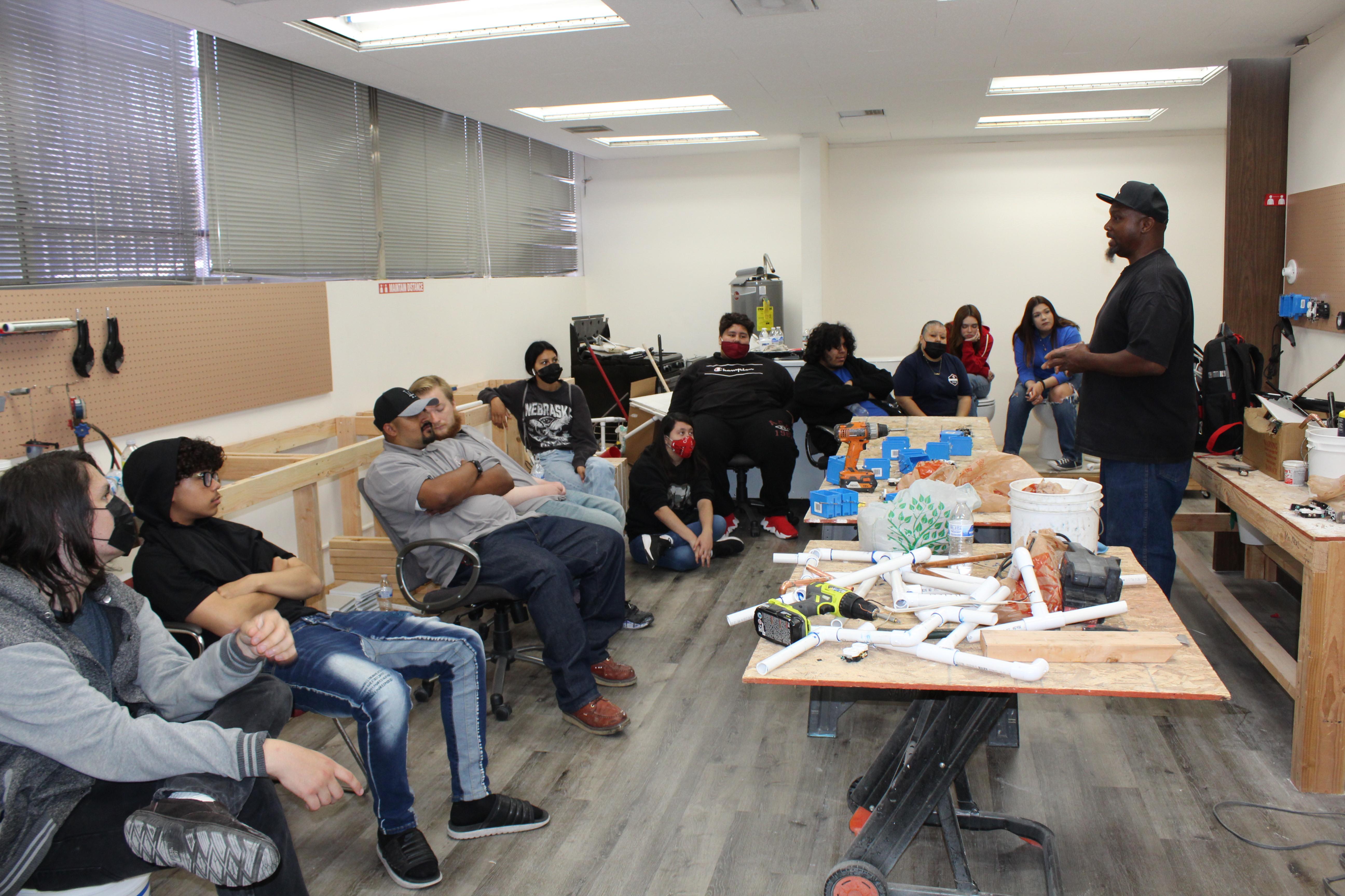 Maurice Neal teaching the CAMT students about wiring