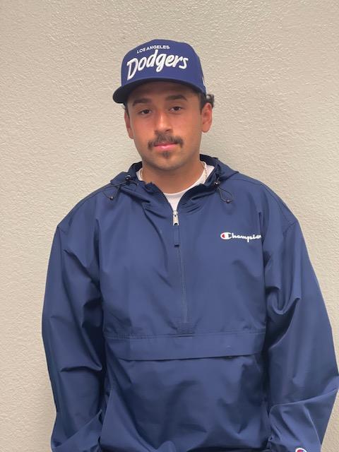 Photo of Anthony Pinto wearing a Dodgers hat