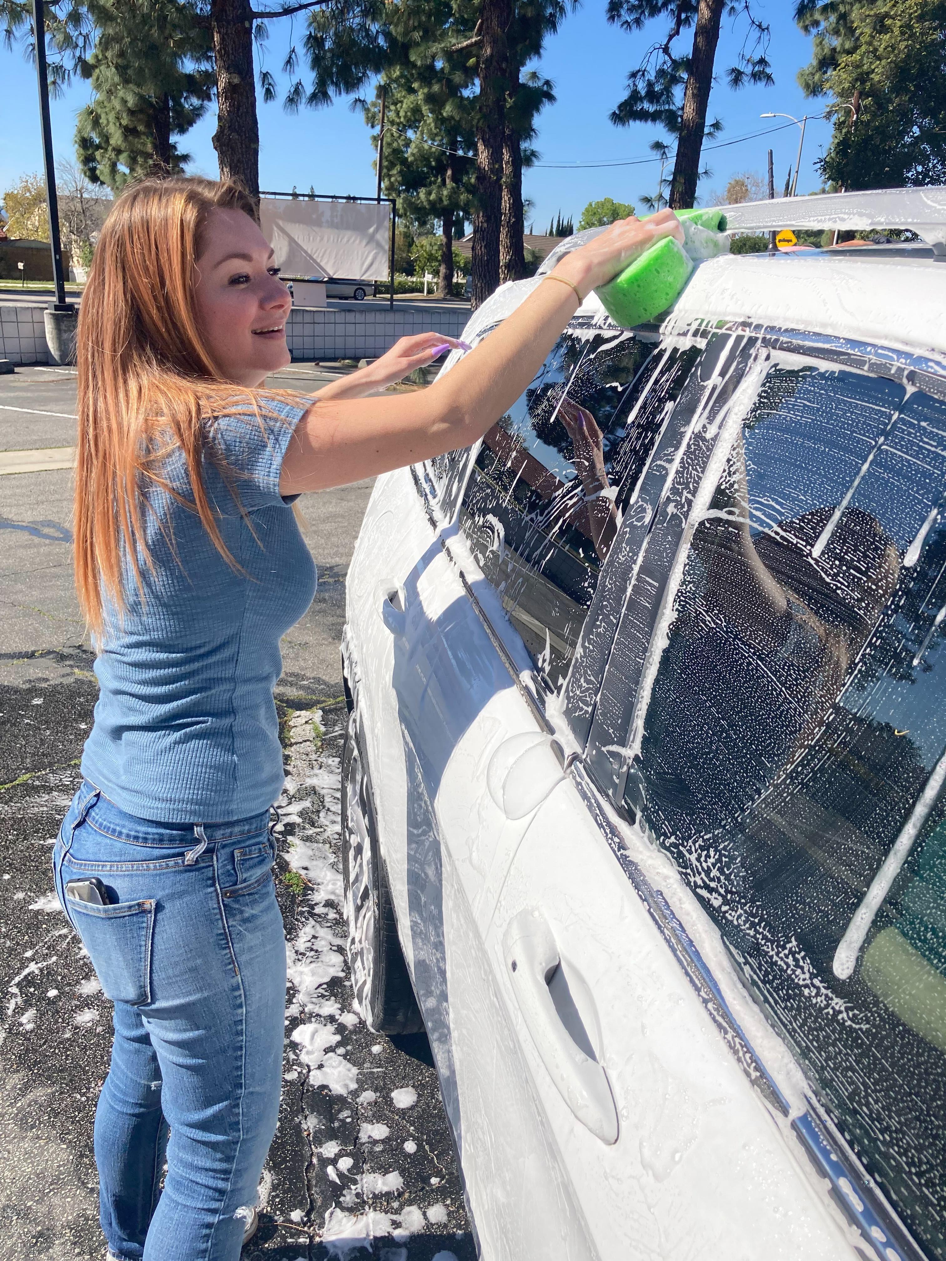 Ms. M washes a car