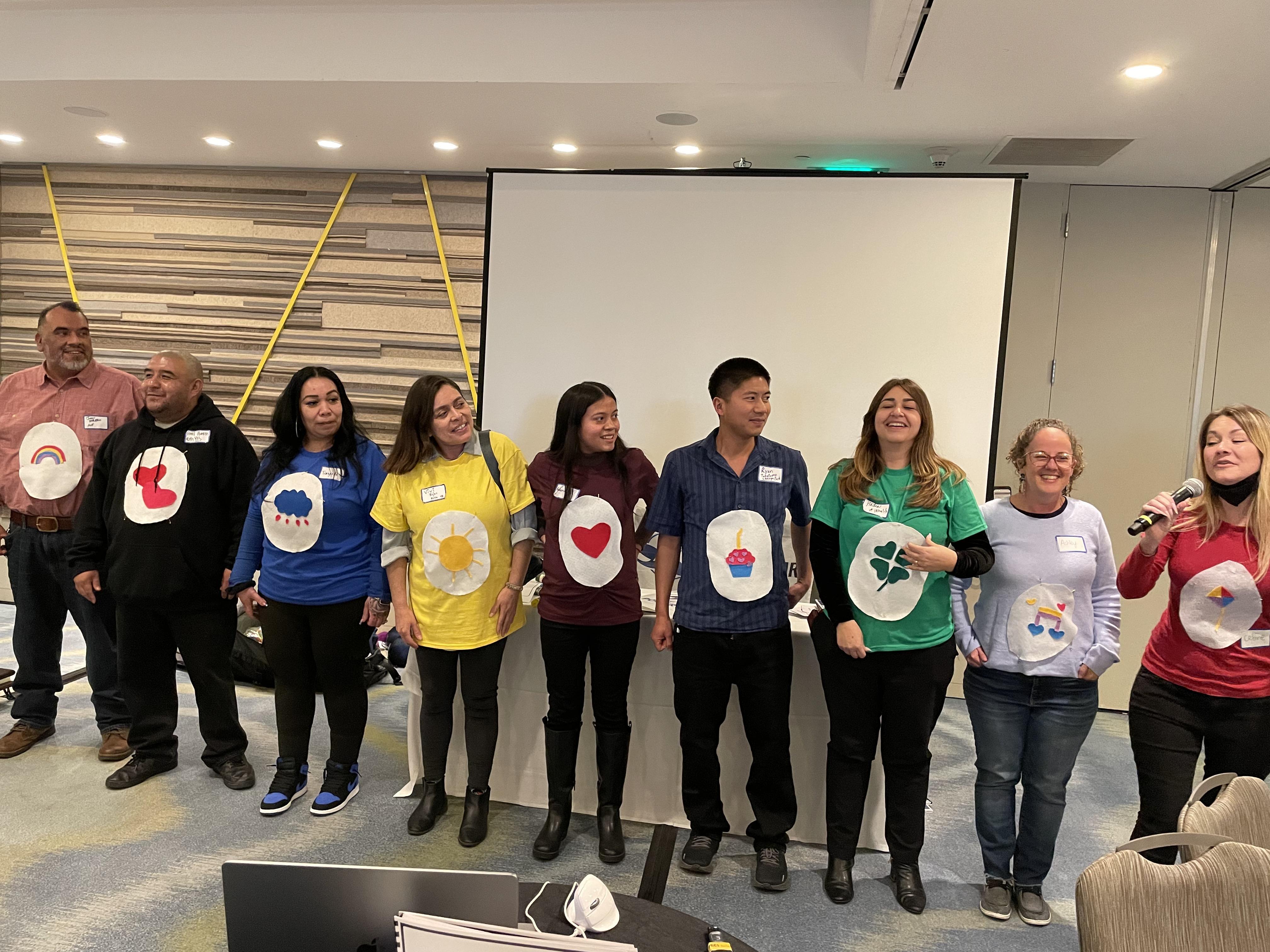 RUTH YouthBuild staff dressed as Care Bears